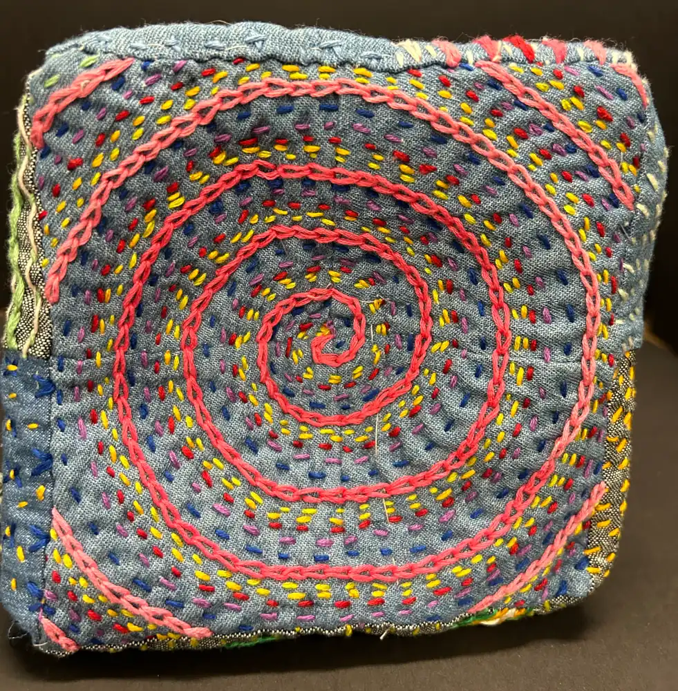 A quilt pillowcase with a swirl pattern