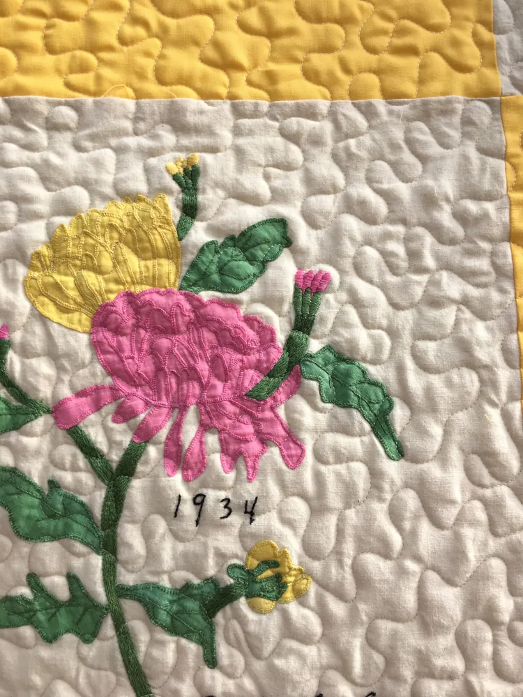 quilt with a vintage floral finish