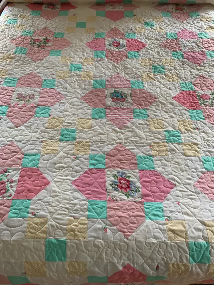 vintage quilt with fractal diamond shapes in light colors